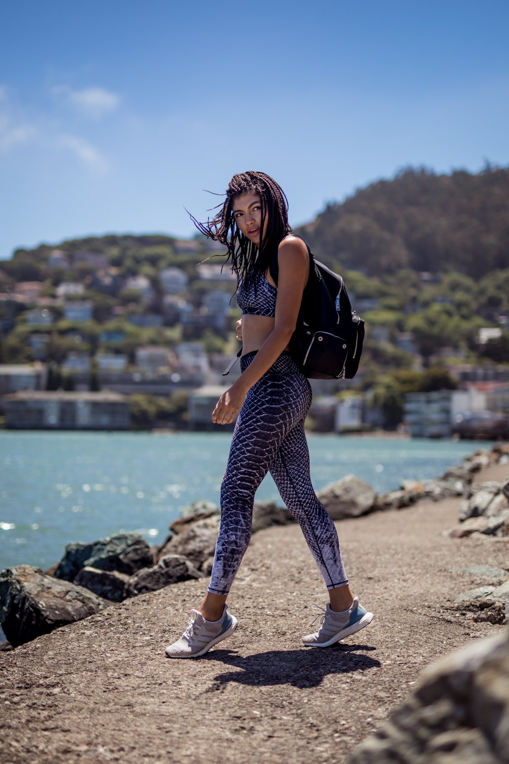 The Sports Edit Fact Fiction Lea backpack and nible snake print leggings and sports bra outfit